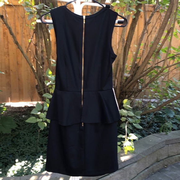 2/$30 Black over the knee peplum dress - Picture 2 of 4